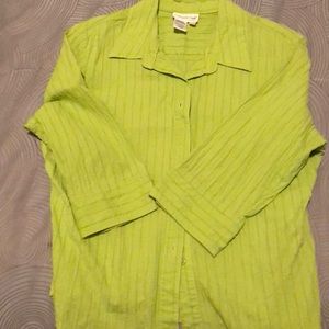 Woman’s button down 3/4 length shirt. Never worn